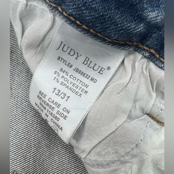 Judy Blue Mid Rise Distressed Released Hem Boot Cut Jeans - Picture 7 of 11